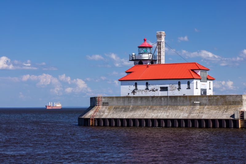 Duluth Lighthouse on Lake Superior with Ship in the Distance