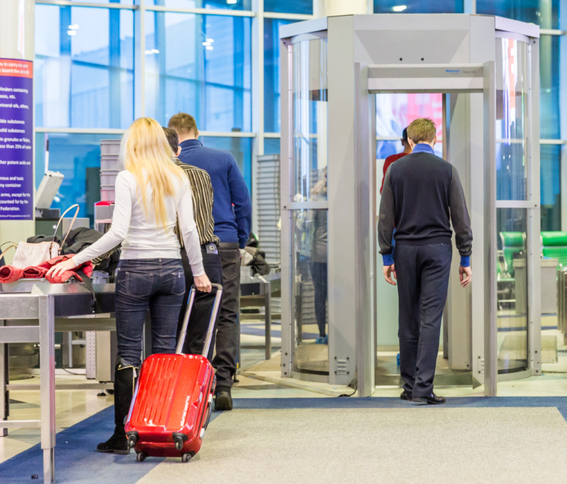 People in the hall of the airport security inspection secition