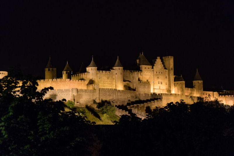 Floodlit medieval walls and towers of Carcassonne at night