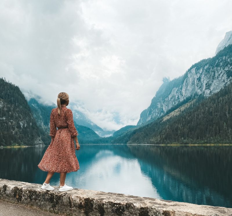 Woman standing and looking on a beautiful scenery