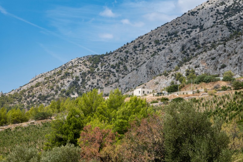 Steep Vidova Gora mountain rising above Brac island beaches