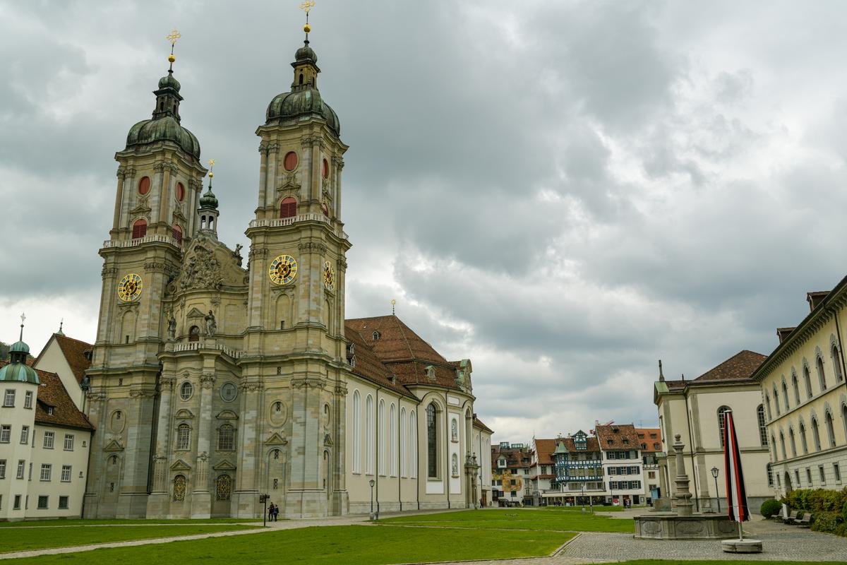 St. Gall Abbey, Baroque architecture, Switzerland, dramatic skies, green courtyard