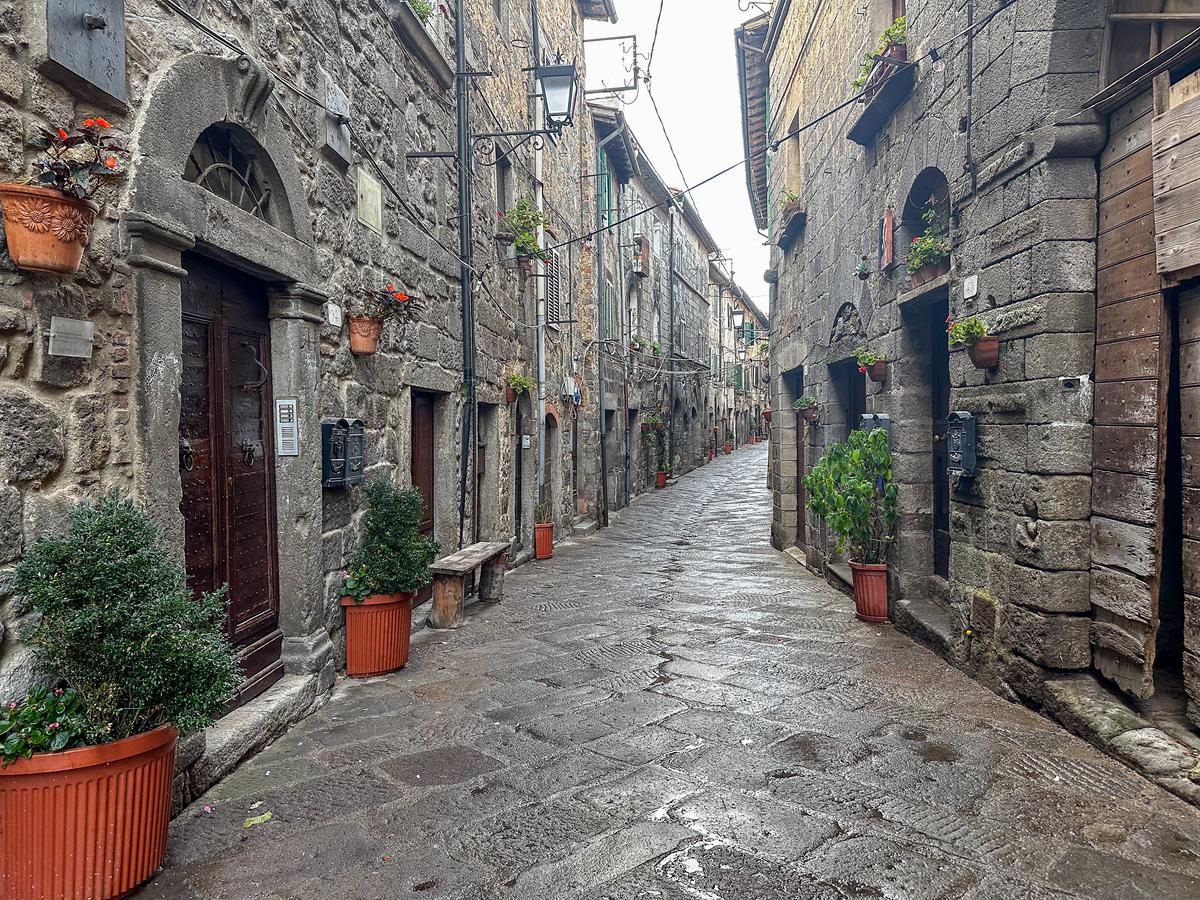 Medieval cobblestone street in Abbadia San Salvatore, Tuscany