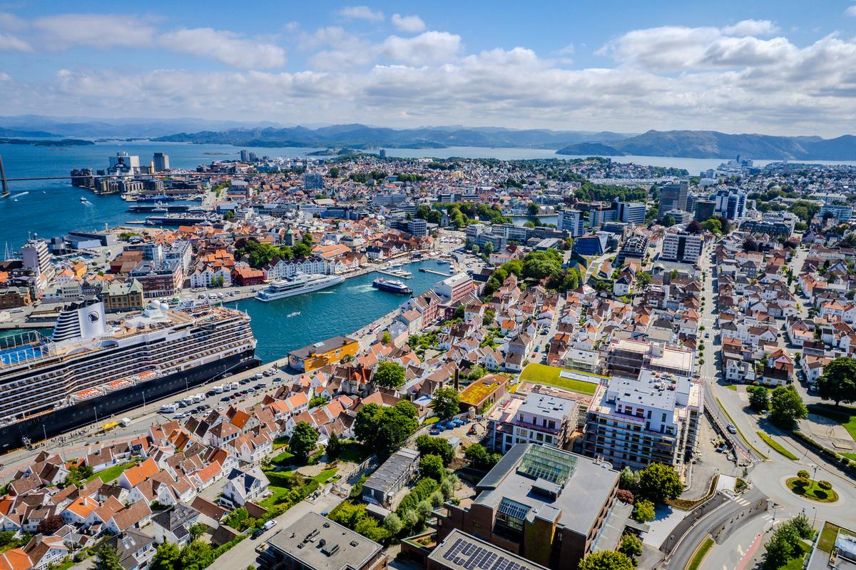 Aerial view of Stavanger, Norway with cruise ships, cityscape, and harbor on a sunny day