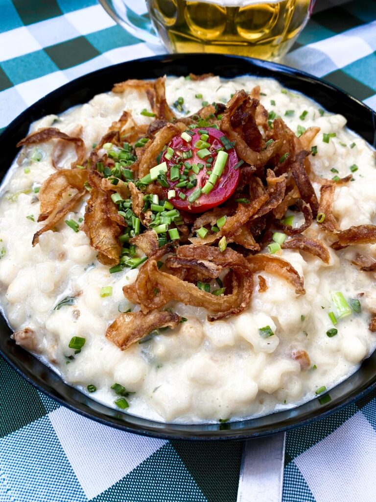 Authentic German Käsespätzle with crispy onions and chives