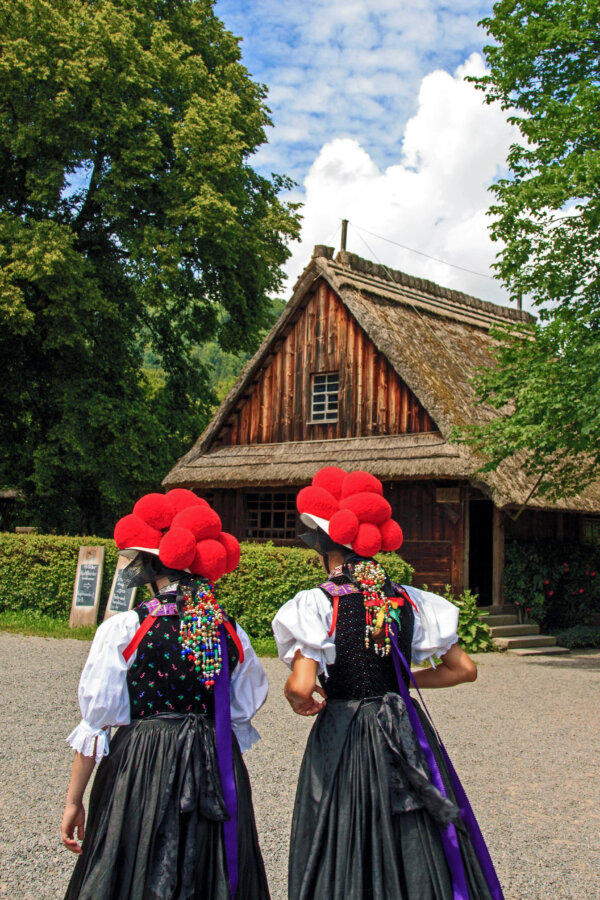 Ladies in Black Forest wearing Bollenhut