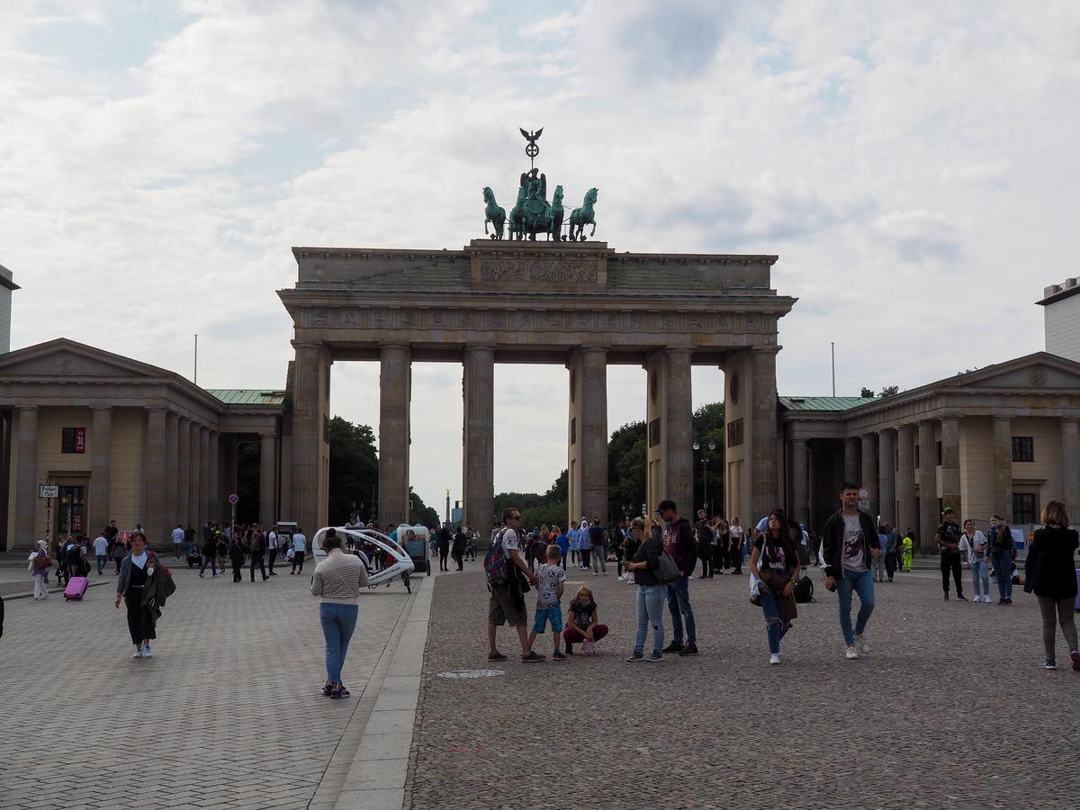 Brandenburg Gate with Quadriga under a cloudy Berlin sky