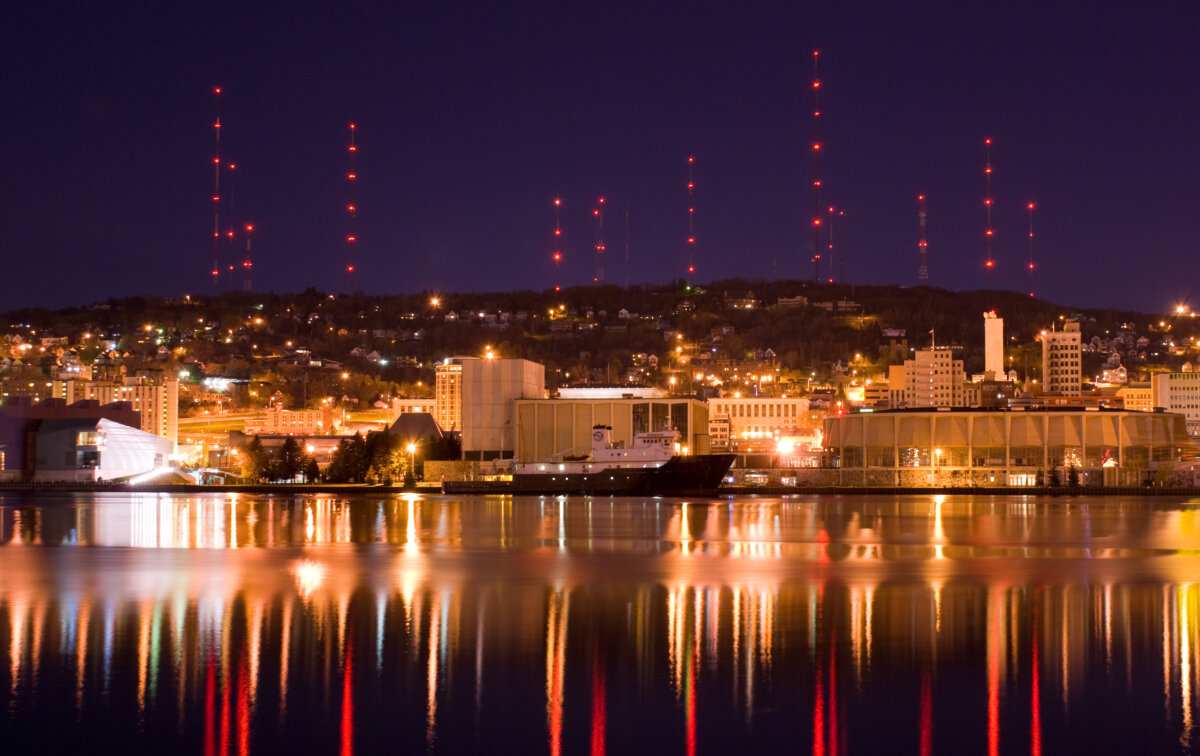 The Duluth Minnesota skyline at night along the canal