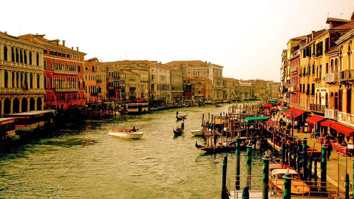 Gondolas and historic palaces along Venice's Grand Canal