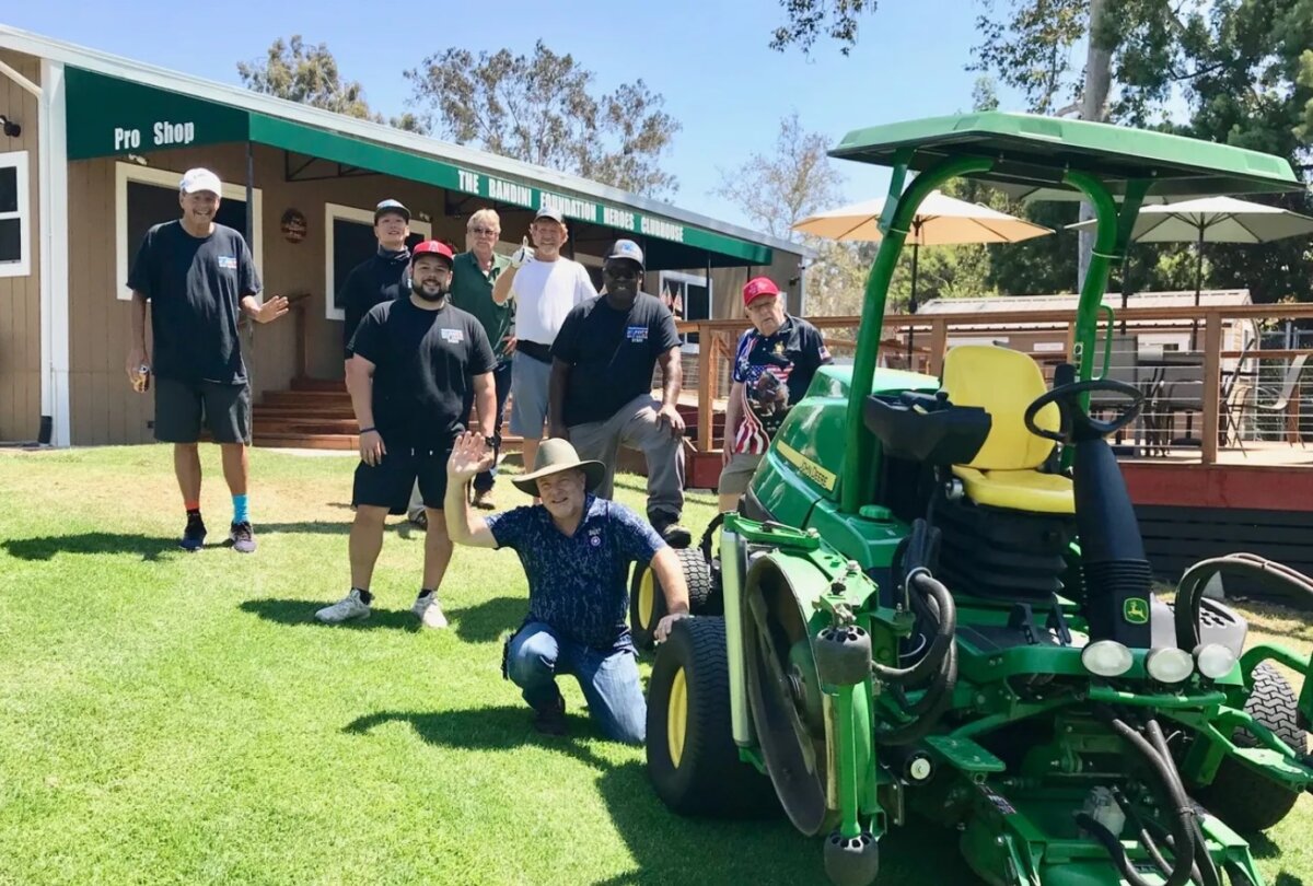 Group playing golf in Heroes Golf Course