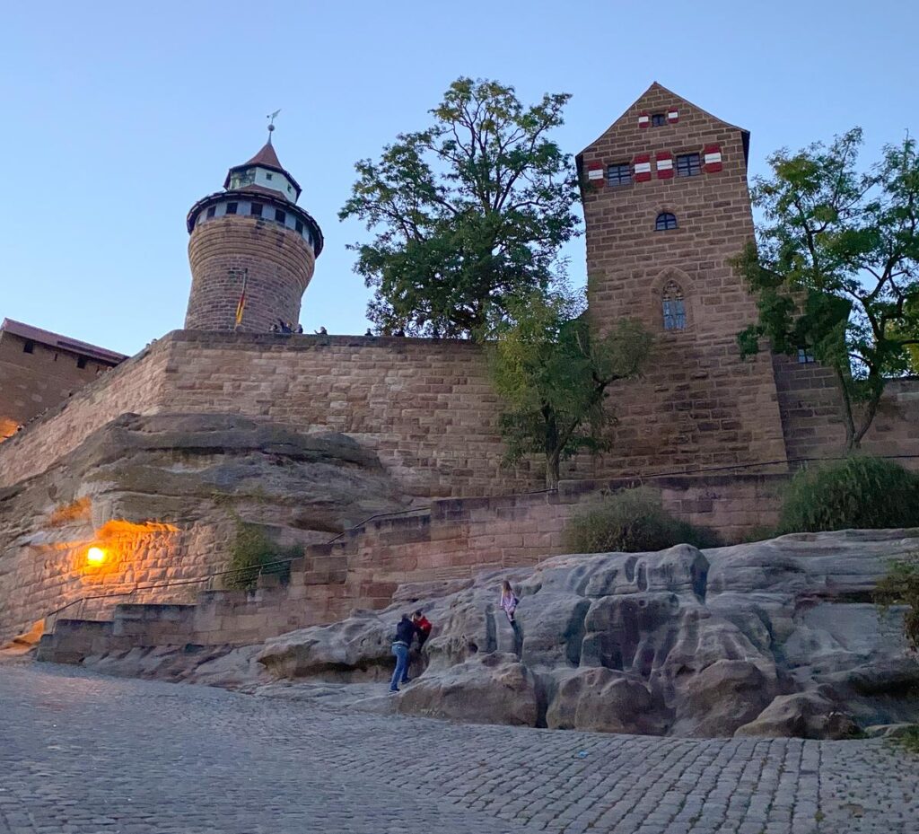 Imperial Castle of Nuremberg at twilight, showcasing medieval architecture against a serene sky