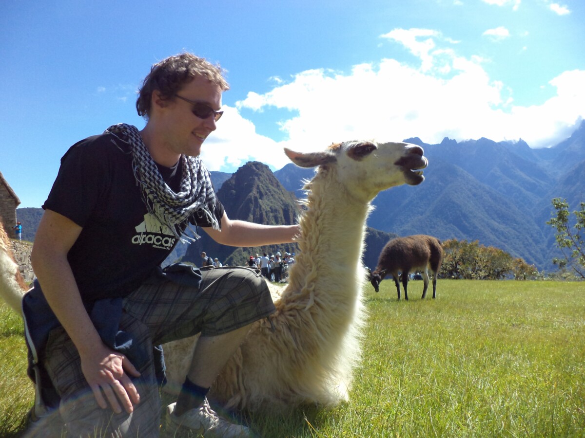 Author Stuart Jameson with a Llama in Machu Picchu