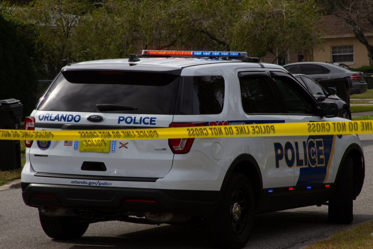 Orlando Police vehicle and police tape