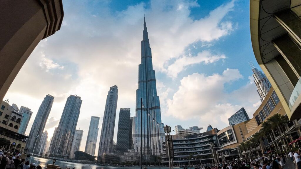 Burj Khalifa rising above Downtown Dubai at sunset
