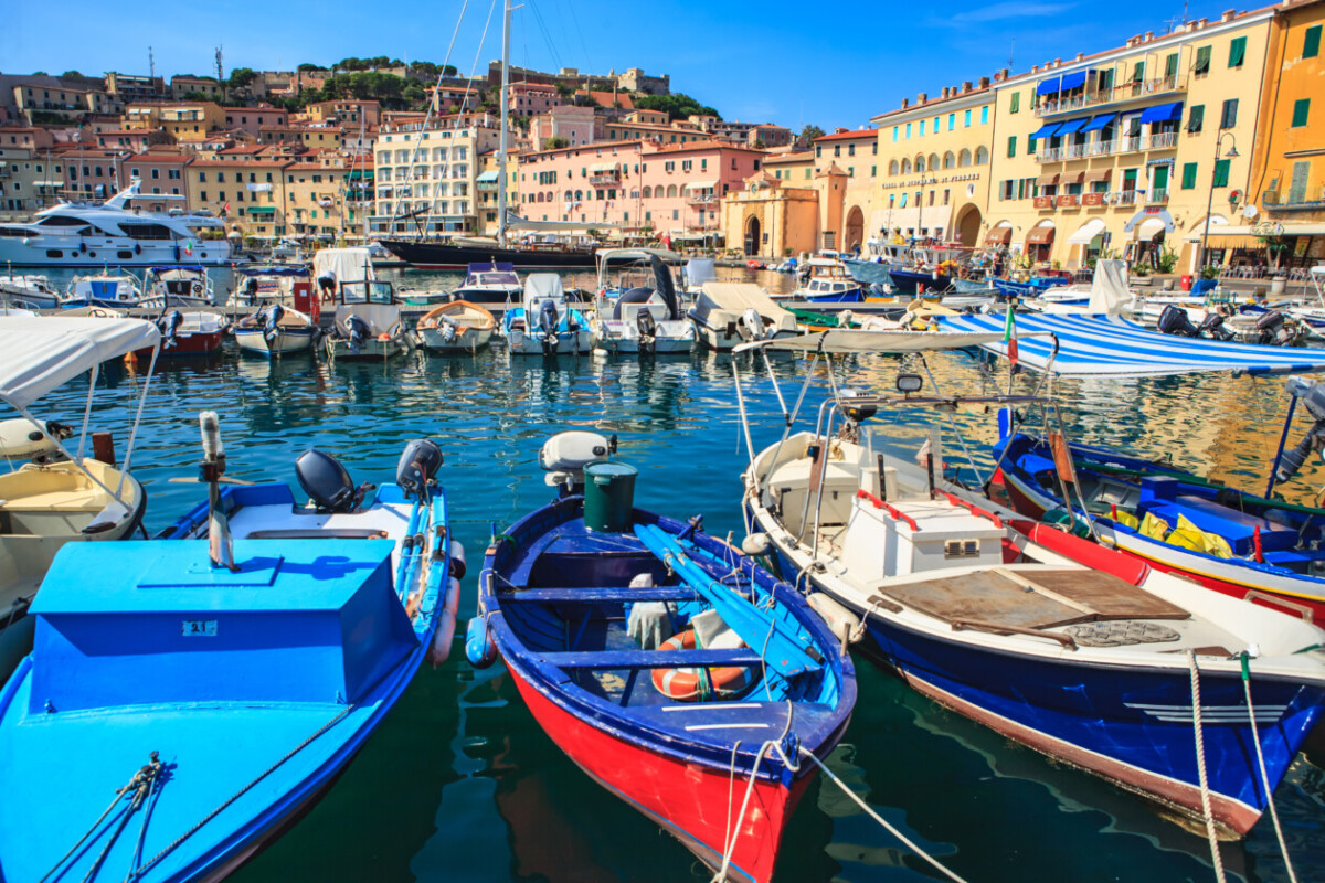 The port and streets in Boats on the harbor of Portoferraio in Italy