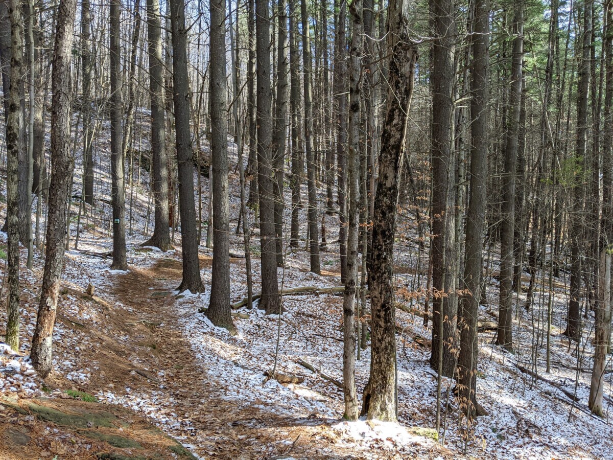 Snow covered trail in Sunset Rock, Stowe, Vermont